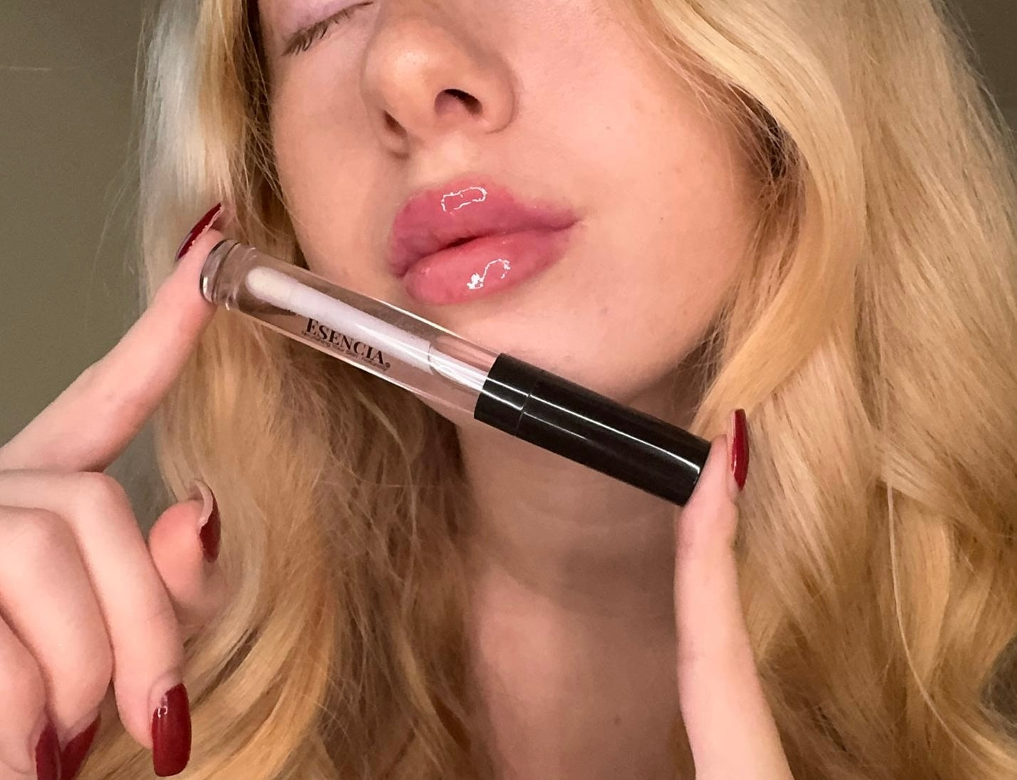 NEW Plumping Lip Gloss - Model